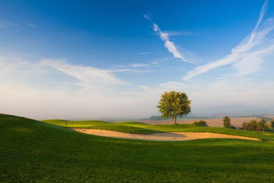 Misty morning on a empty golf course