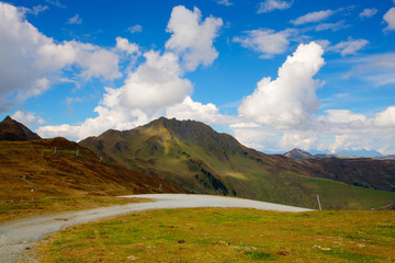 Fototapeta na wymiar Steep road in Tirol mountains,Austria - HDR Image