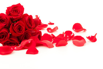 Fototapeta na wymiar Red roses and petals