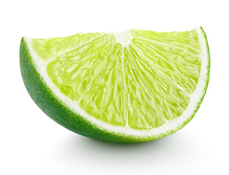 Slice of lime citrus fruit isolated on white with clipping path