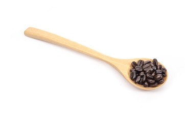 Roasted coffee beans in wooden spoon