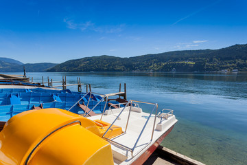 The lake of Millstatt with paddle boats,, Carinthia, Austria