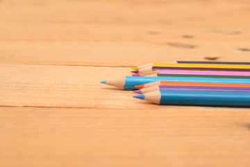 Obraz premium Colored pencils on wood