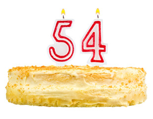 birthday cake with candles number fifty four isolated on white