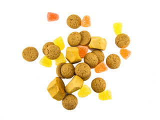 Pepernoten and candy isolated on white