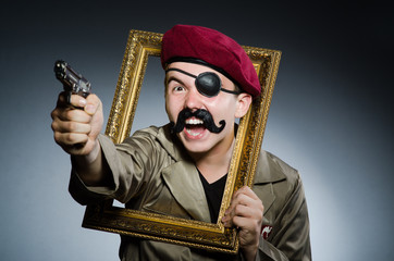 Funny soldier in military concept