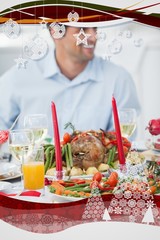 Handsome man having christmas dinner