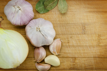 garlic and onion on cutting board