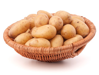 Potato tuber  in wicker basket isolated on white background