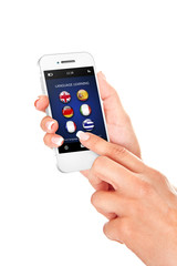 hand holding mobile phone with language learning application ove