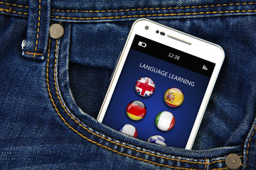 mobile phone with language learning application in jeans pocket