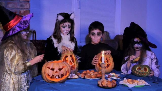 Children In Halloween Costumes Doing Magic