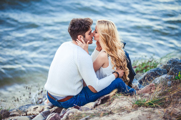 couple in love on the beach in autumn