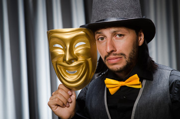 Funny concept with theatrical mask