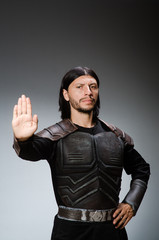 Funny knight against dark background