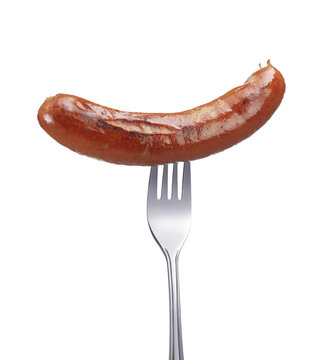 Gegrillte Rindswurst auf Gabel
