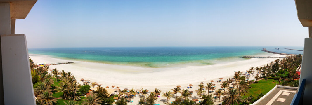 The panorama of beach and turquoise water of the luxury hotel, A