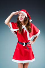 Snow santa girl in red costume