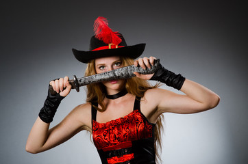 Woman pirate with sharp weapon