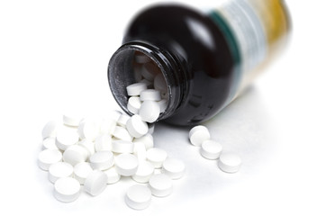 White vitamin pills white background