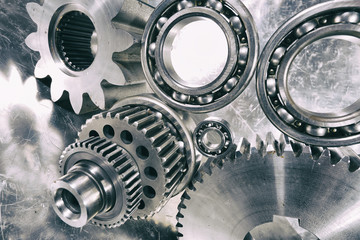 cogwheels and ball-bearings, titanium and steel