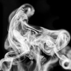 White smoke on black background