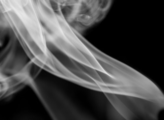White smoke on black background