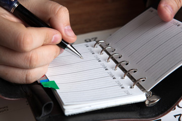 man running with diaries
