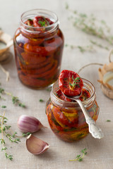 Sun dried tomatoes with herbs and sea salt in olive oil