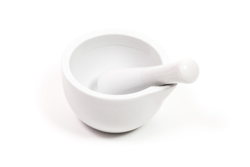 white porcelain mortar and pestle set