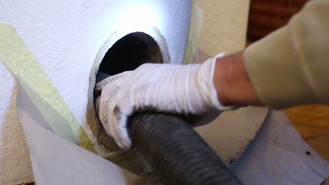 Cleaning the gas passes of a masonry heater