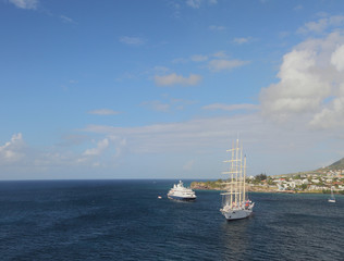 Fototapeta na wymiar Motor and sailing yachts at coast of Saint Kitts