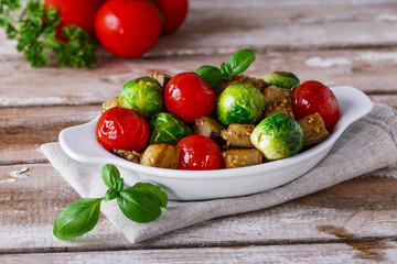 roasted vegetables eggplant, brussel sprouts, tomatoes basil