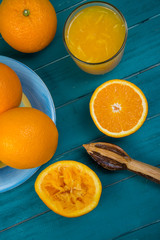 Homemade fresh organic orange juice and squeezer