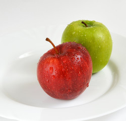 Two apples on a white plate