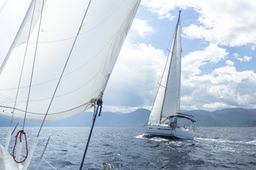 Sailboat race. Sailing on a calm sea. Luxury yachts.