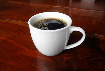 White Mug Full of Bubbly Coffee