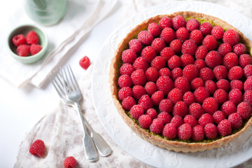Fresh raspberry and pistachio cream tart