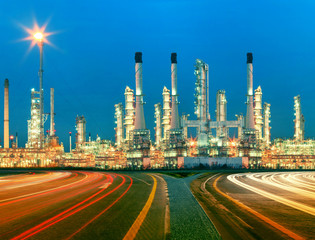 Fototapeta na wymiar beautiful lighting of oil refinery plant in heav petrochemicaly