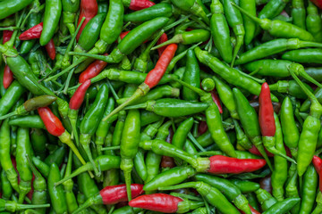 Tropical chilli peppers background