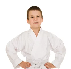 Foto auf Acrylglas Kampfkunst Junge in Kleidung für den Kampfsport