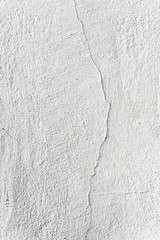white wall with cracks