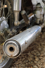 old motorcycle exhaust pipe dirty