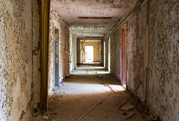 Fototapeta na wymiar Old and abandoned corridor of building