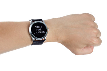 A hand wearing a black wrist watch. Time for change concept