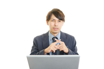 禁止の意思表示をするビジネスマン