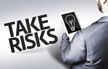 Business man with the text Take Risks