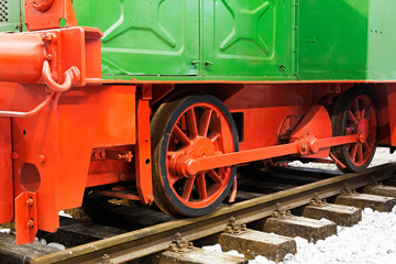 Wheels  of an old locomotive on the rails