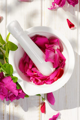 Rose petals in a mortar