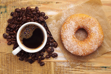 Donut with sugar and coffee